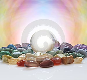 Crystal ball surrounded by healing crystals