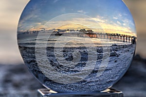 Crystal Ball view of Sunset at the Naples Pier on Naples Beach