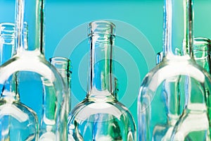 Crystal bottlenecks of empty glass wine bottles