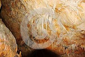 The crystal caves of Bermuda. Incredible formations of white stalactites covered with crystallized soda straws.