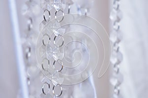 Crystal chandelier. Big classic crystals. Low angle shot of a big beautiful crystal luxury chandelier. With bling bling shining