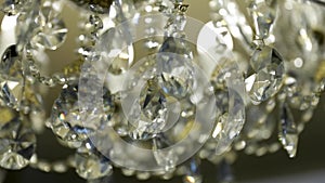 Crystal chandelier. Close up of the crystals. Close up shot of a big beautiful crystal luxury chandelier. With bling