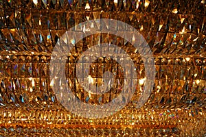 Crystal chandelier with warm light.