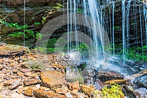 Crystal clean small waterfall close up shot in Transylvania