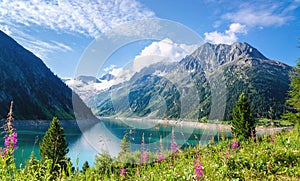 Crystal clear alpine lake Schlegeis, Austria photo
