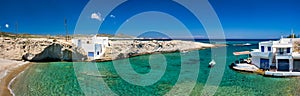 Crystal clear blue water at MItakas village beach, Milos island, Greece.