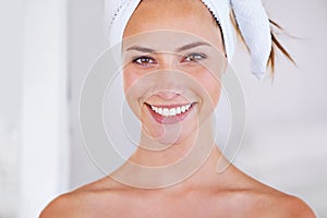 Crystal clear complexion. Head and shoulder shot of a stunning woman with a flawless complexion.