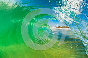 Crystal clear inside out view of a barreling wave