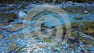 Crystal clear river in the valley of the Ordesa National Park. Spain