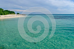 The crystal clear and shallow waters on the islands of the tropical Dry tortugas and the clean and private beaches