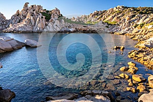 Crystal-clear, turquoise-blue water in a beautiful bathing bay on Sardinia