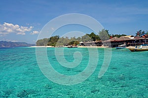 Crystal clear turquoise water off the Gili Meno's coast photo