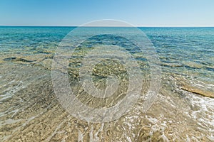 Crystal clear water in Costa Rei photo