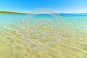 Crystal clear water in Lazzaretto beach photo