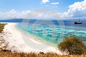 Crystal clear water in Sabolon Besar island, one of the many island paradise spots for diving in Komodo Nat Park photo