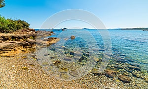 Crystal clear water in Santa Maria Navarrese beach photo