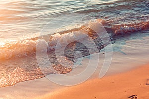 Crystal clear water splashing on shoreline