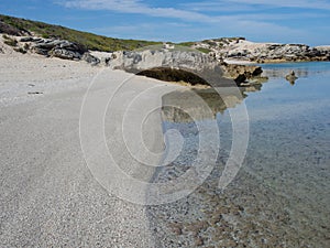 Crystal clear water and white beach at South Africas coast