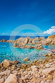 Crystal clear waters of Li Cossi beach, Sardinia