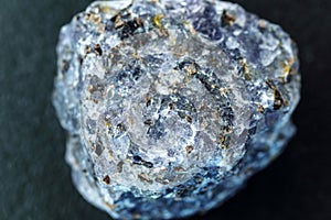 Crystal of cordierite iolite gem stone cutout, raw mineral, black background