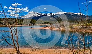 Crystal Creek reservoir near snow-capped mountains Pikes Peak Mountains in Colorado Spring, US