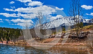 Crystal Creek reservoir near snow-capped mountains Pikes Peak Mountains in Colorado Spring, US
