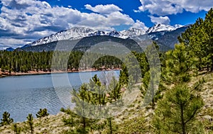 Crystal Creek reservoir near snow-capped mountains Pikes Peak Mountains in Colorado Spring, US