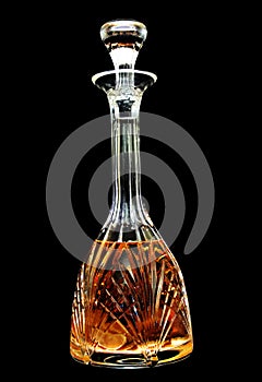 A crystal decanter with whiskey photo