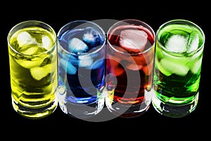 4 Crystal Glasses with 4 Different Coloured Cold Drinks