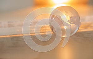 Crystal Globe On Financial Papers
