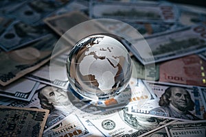 Crystal globe on many currency