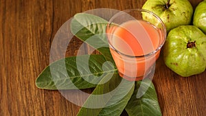 Crystal Guava fruit with leaves isolated on the wooden background