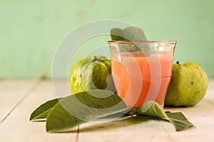 Crystal Guava fruit with leaves  on the wooden background