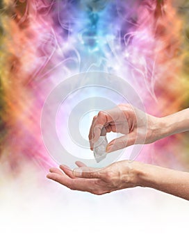 Crystal healer sensing energy with terminated quartz
