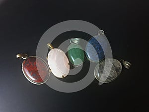 Crystal healing pendants Jasper, clear white quartz, rose quartz, aventurine and lapis lazuli.