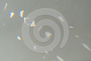 .Crystal light reflections for overlay mockup on light background. Abstract prism reflection, rays leaking through lens