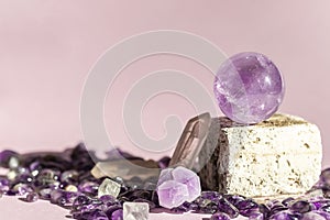 Crystal minerals for meditation on pink background. Magic Rock for Healing stones.