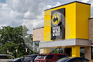 Crystal, Minnesota - July 21, 2019: Exterior of a Buffalo Wild Wings chain restaurant. Also known as B-Dubs, this dine-in