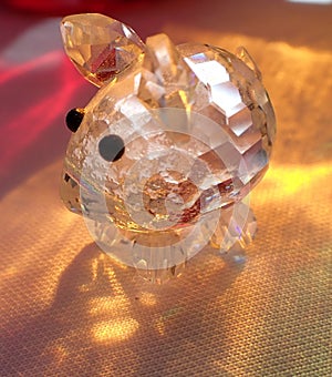 crystal mouse with colorful glass bottle reflections