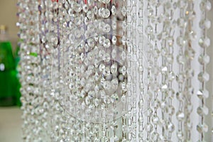 Crystal ornament hanging as a part of wedding decoration.