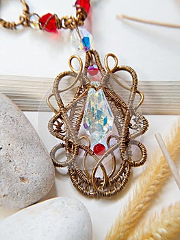 Crystal pendant strung with Copper wire