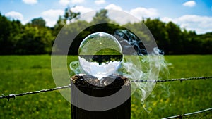 Crystal, Photo, Light, Glass Ball in bluebell wood forest showing upside down magnified image magnifying sun burning hole spot wit