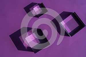 Crystal prism refracting light, magic crystals and pyramid, sphere and cube on purple background. Spiritual healing