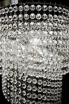 Crystal strass lamp white over black background photo