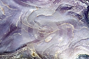 Crystal surface of a stone, fantastic abstract background. Macro