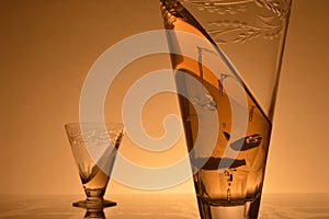 Crystal water goblets with sloshing fluid
