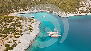 Crystal water sea lagoon and yachts along the Aegean coast