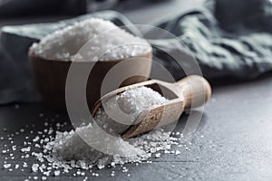 Crystaline sea salt in bowl and spoon - closeup