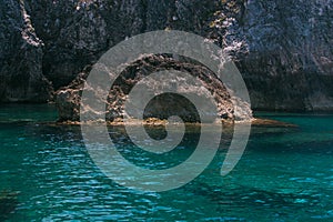 Crystalline water in the Rondinelle cave, Tremiti islands photo