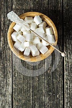 Crystallized sugar on wooden stick.